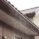 Heavy rain on a Florida roof during a hurricane.