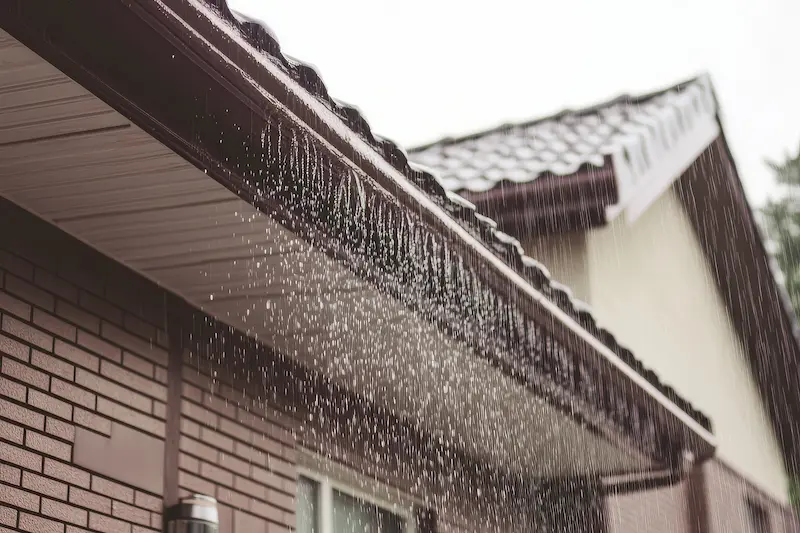 Heavy rain on a Florida roof during a hurricane.