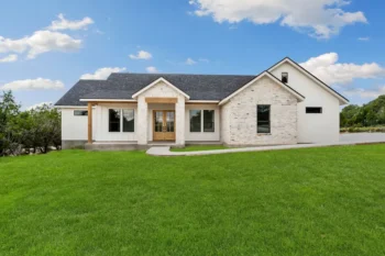 a front view of a Florida home with a green lawn